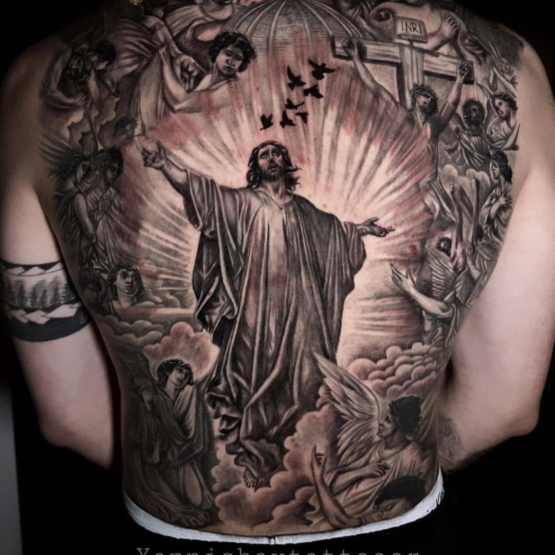 Intricate tattoo of religious scene on back
