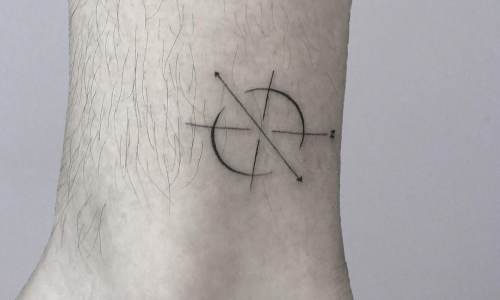 Minimalist tattoo design on ankle featuring circular geometric patterns